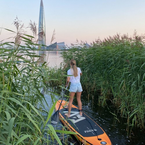Закат на сапбордах на Лахтинском Разливе в Петербурге